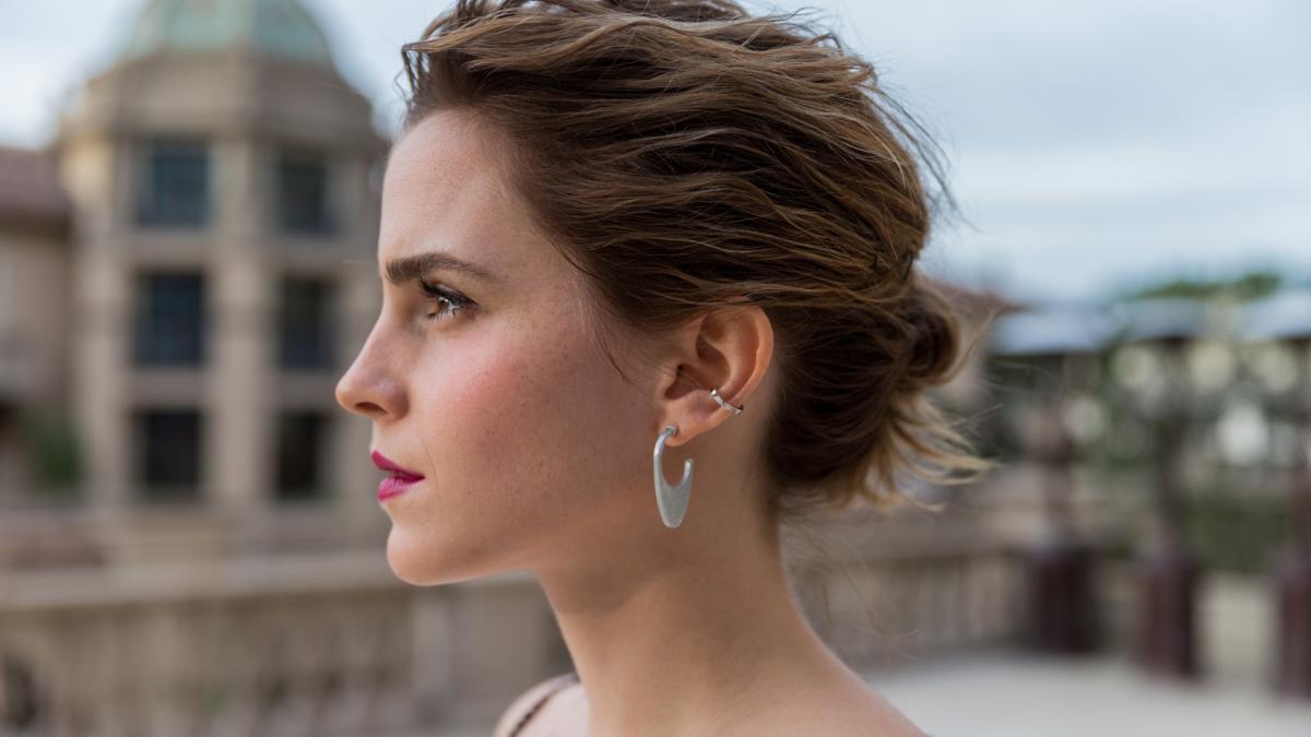 Emma Watson in profile, showcasing her elegant features and poised demeanor (1920x1080)