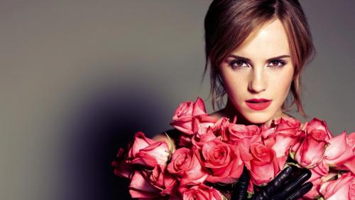 Emma Watson holding roses, radiating beauty and elegance (1920x1080)